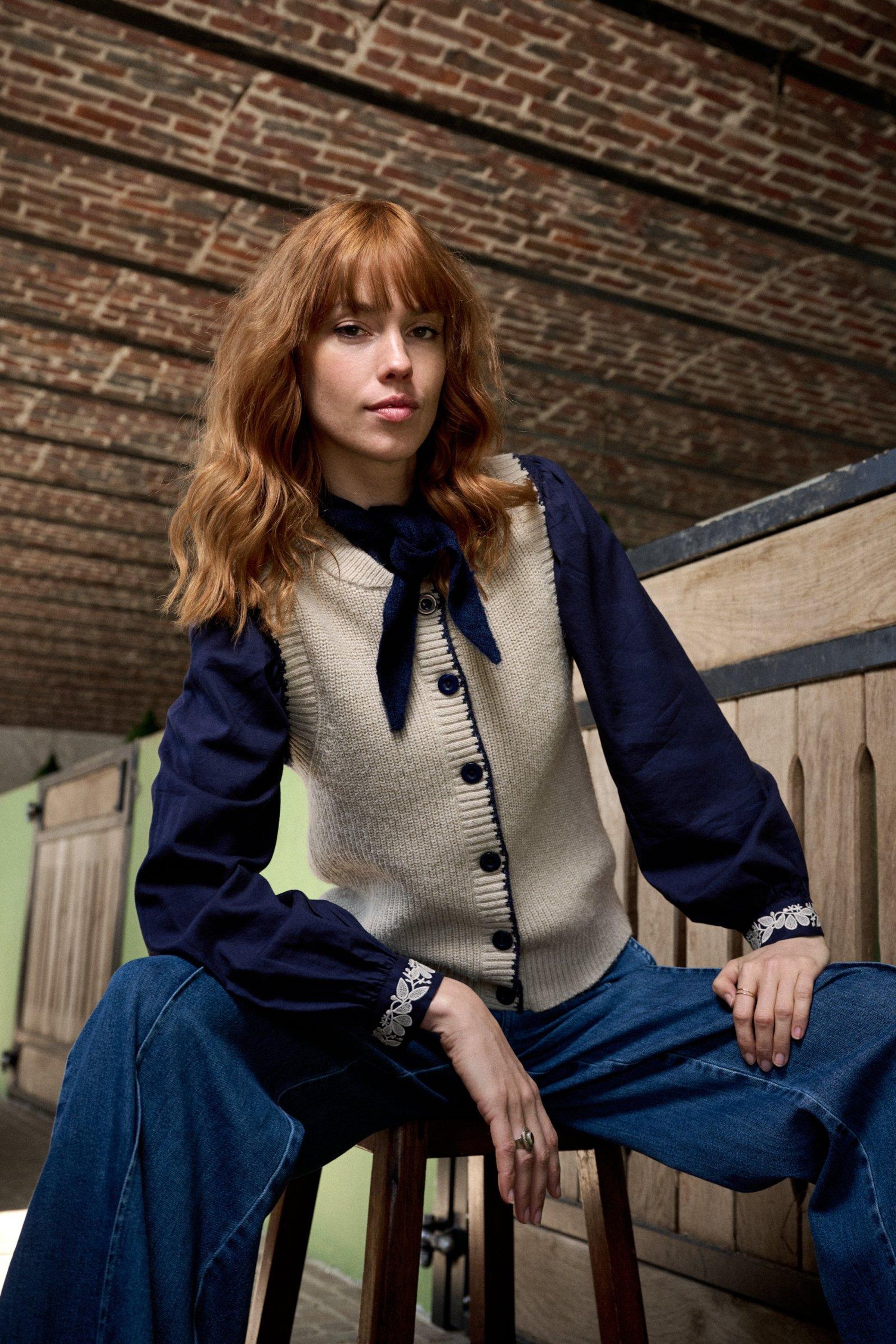Mouwloze cardigan met boord - ame