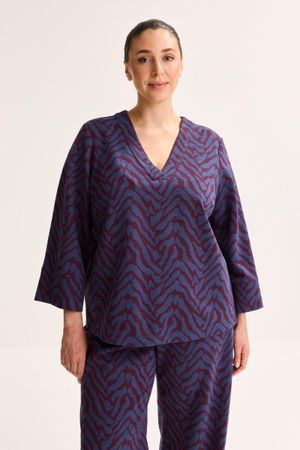 Blouse &agrave; col en V en jacquard jersey