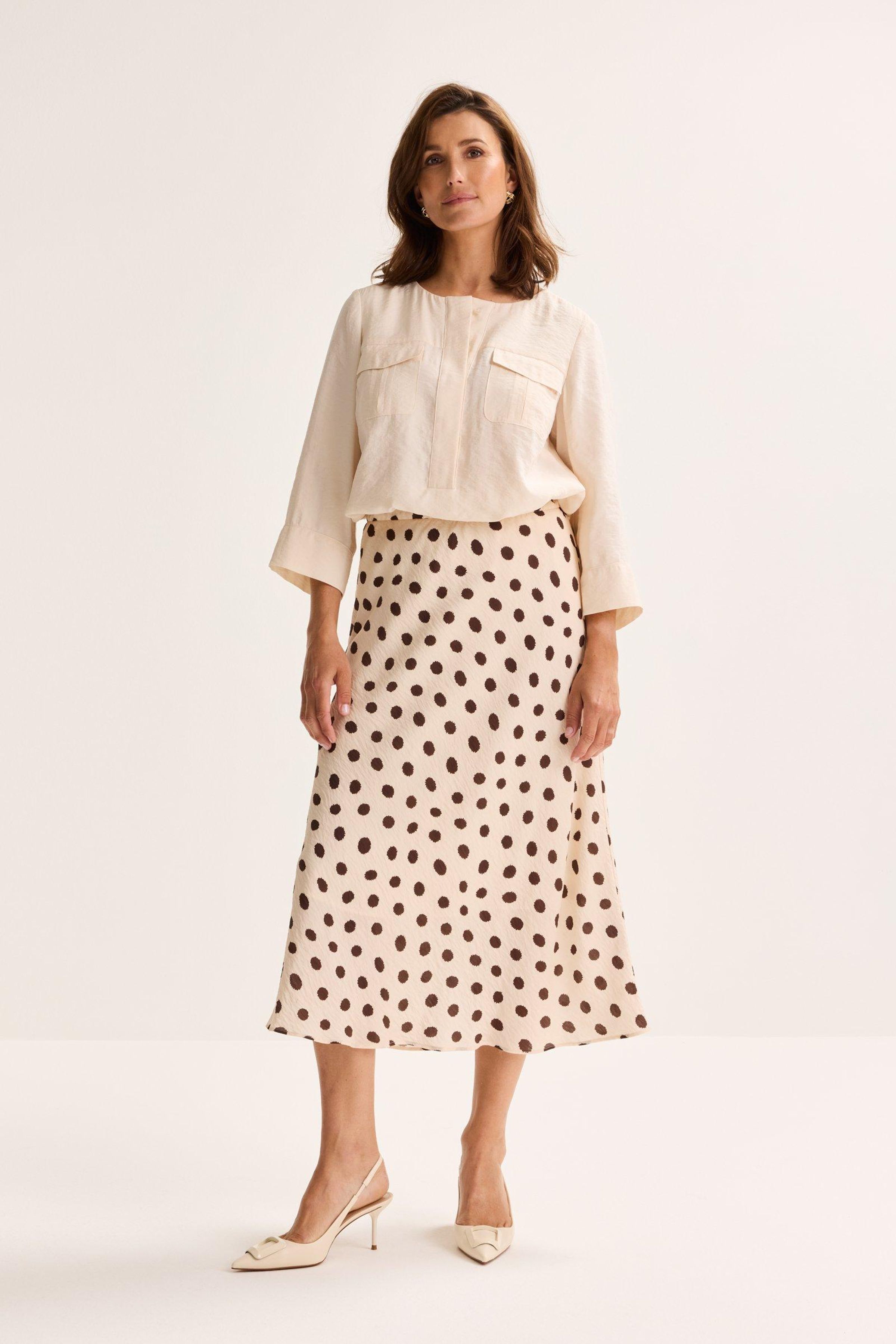 Jupe &eacute;vas&eacute;e &agrave; pois - may